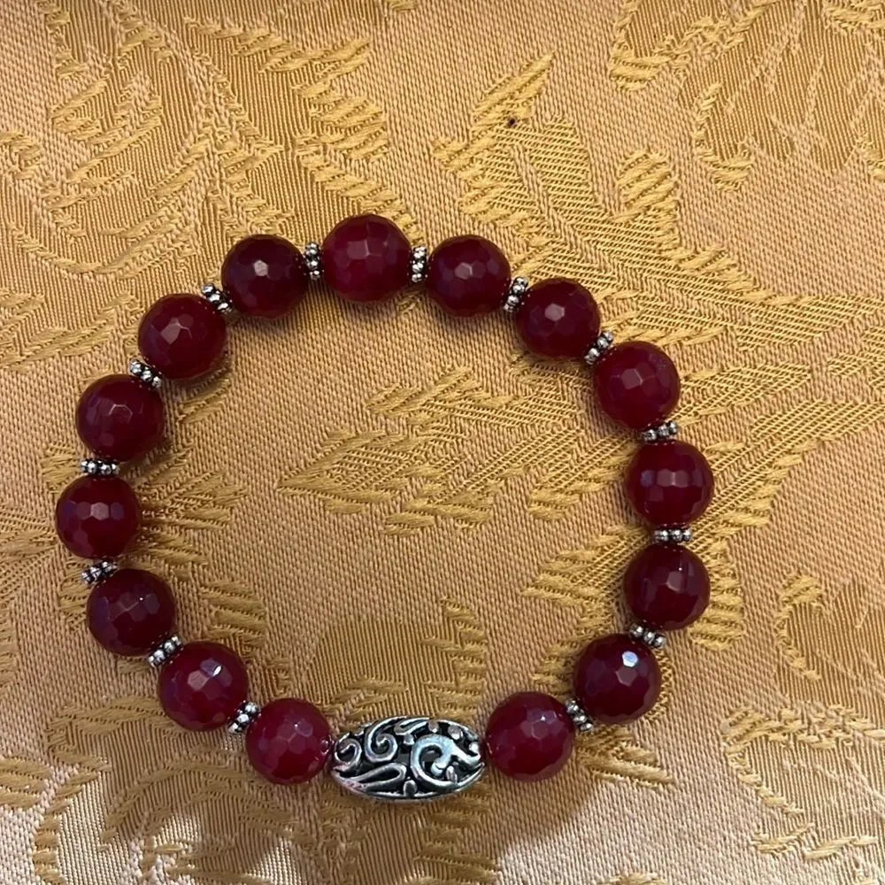 Handcrafted beaded bracelet with metal bead detail